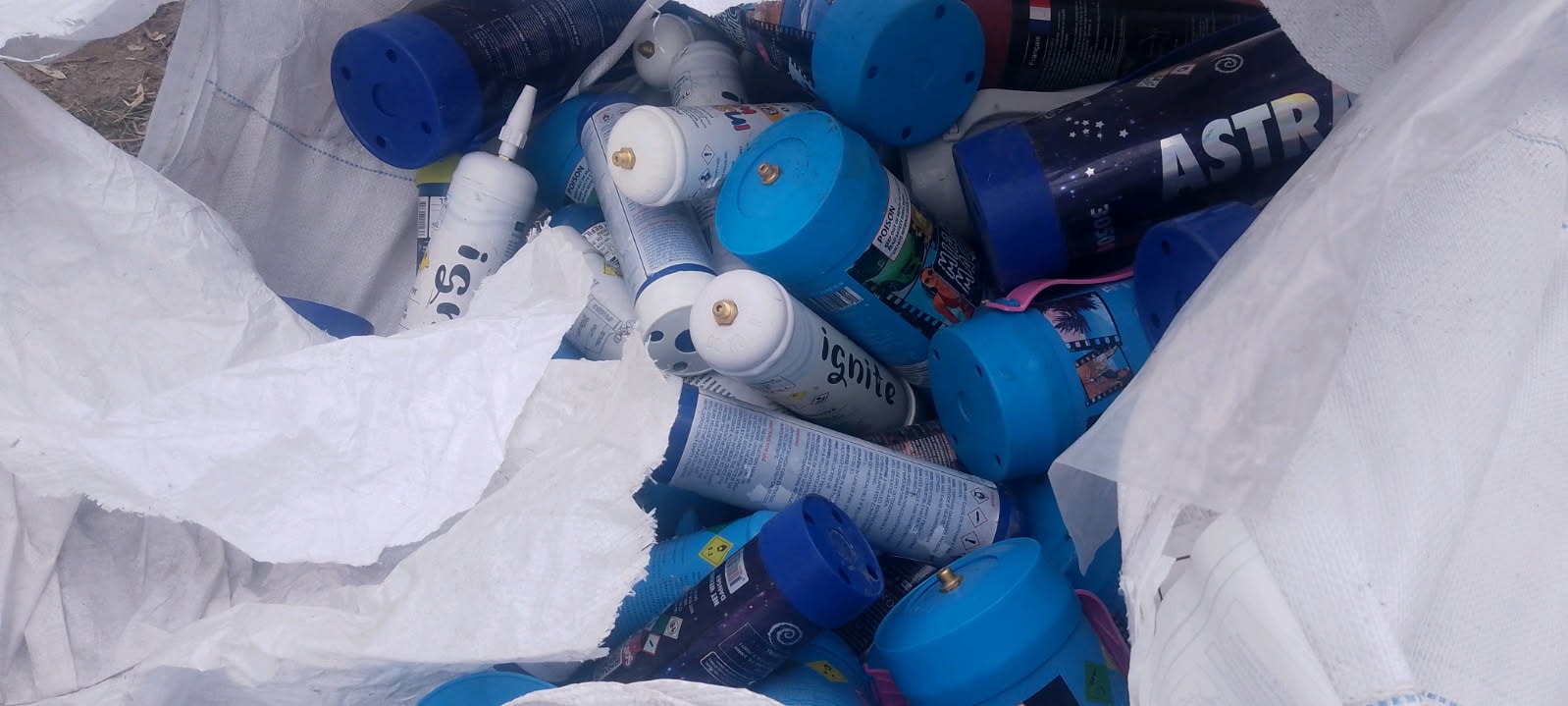 Bin full of collected nang canisters ready for eco-responsible recycling